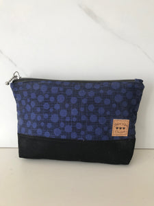 The Caba Pouch - black with blue dots and black bottom