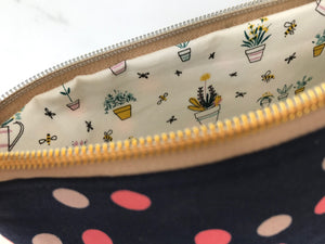 The Caba Pouch - navy with coral and pink polka dots and cork bottom